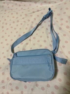 Athleta Girl bagLight Blue Crossbody Bag with Embossed Logo